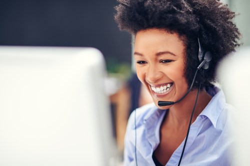 young woman working in a modern call centre