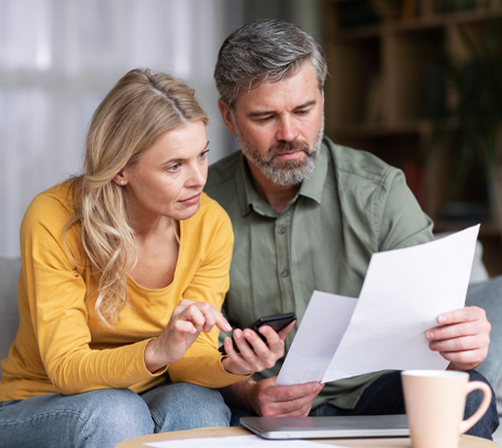 Couple discussing paperwork